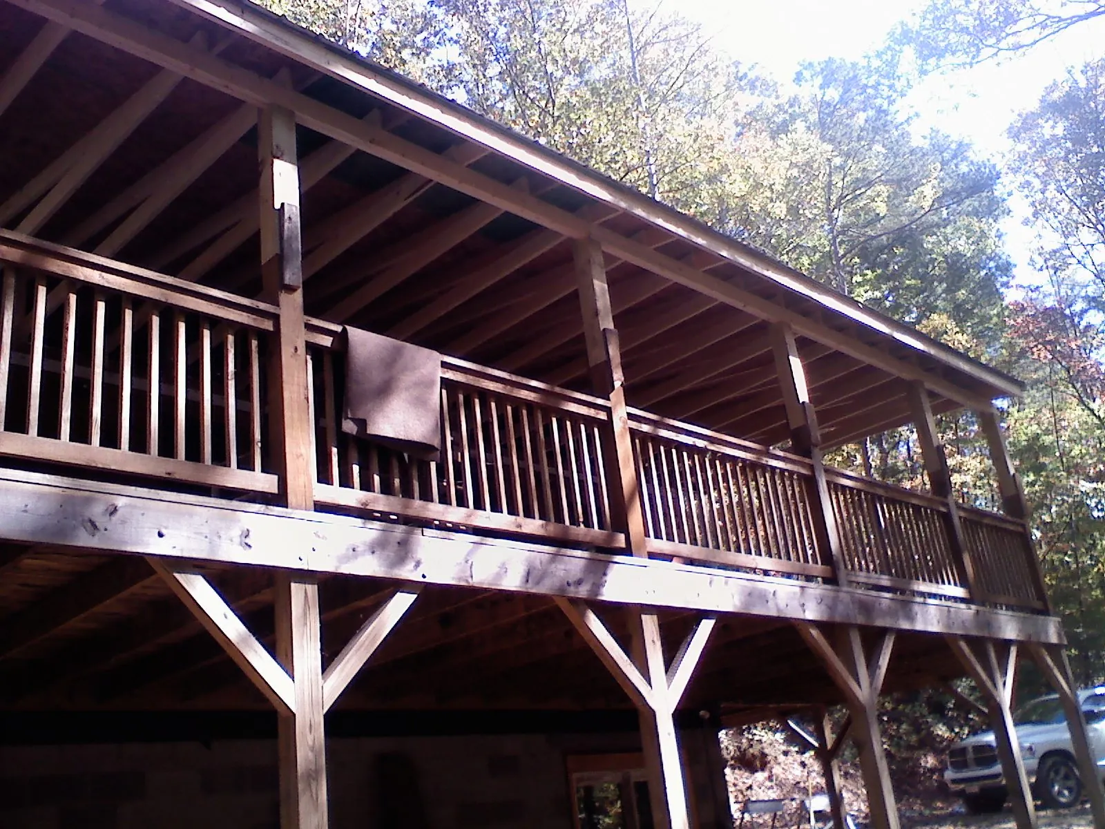 Timber framing under a new elevated porch and deck — Roof Leak Repair in Des Plaines by Roofing Brothers